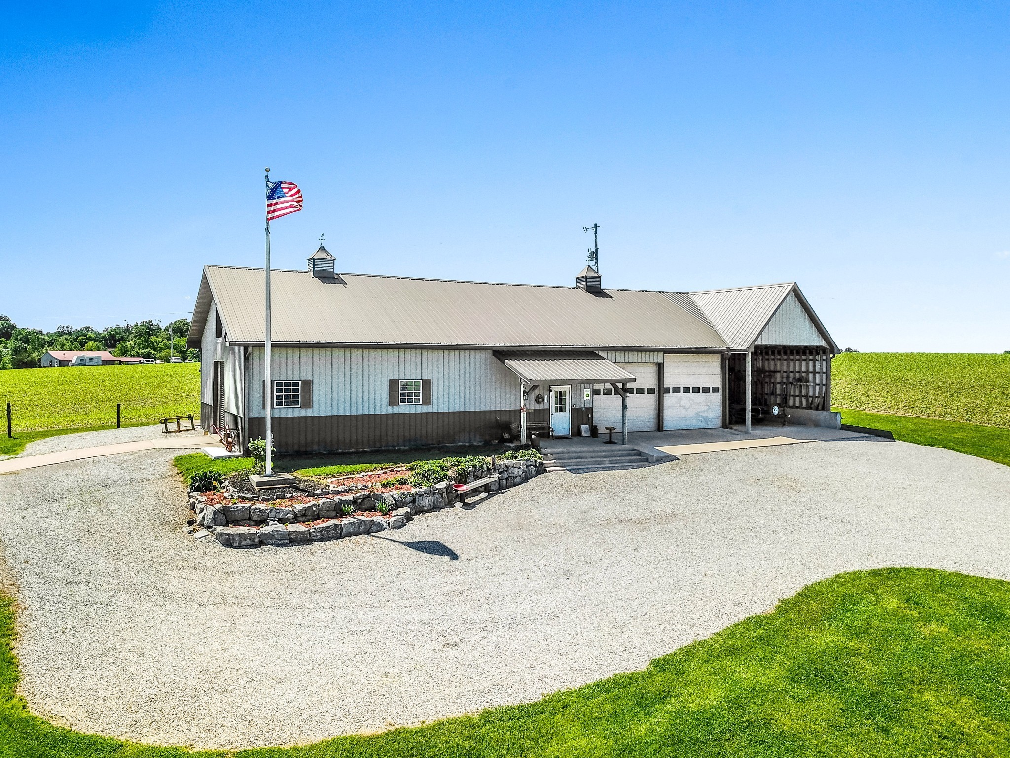 4984 Somerville Road Cross Plains, TN 37049 - Photo 10 of 57 a view of a house with roof yard and sitting area