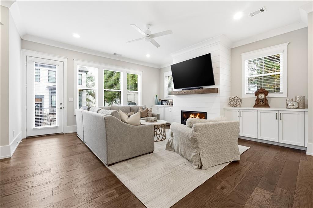 1307 Markham Road Atlanta, GA 30319 - Photo 16 of 47 a living room with furniture and a flat screen tv