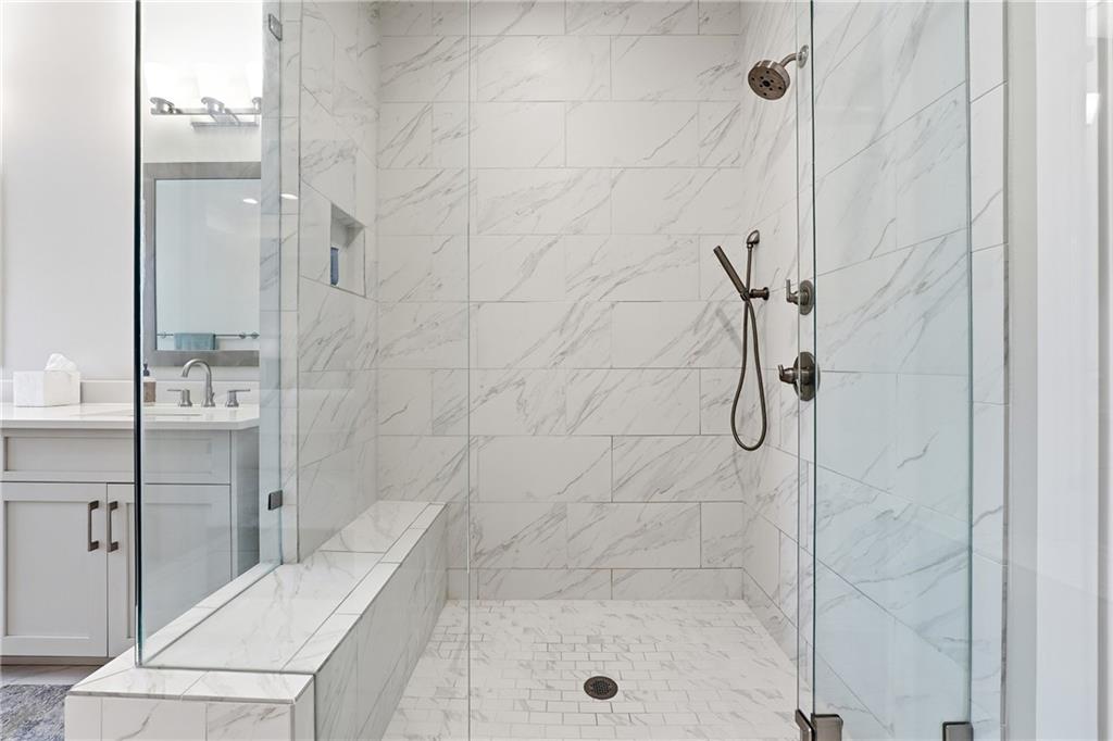 1307 Markham Road Atlanta, GA 30319 - Photo 28 of 47 a bathroom with a shower and a sink