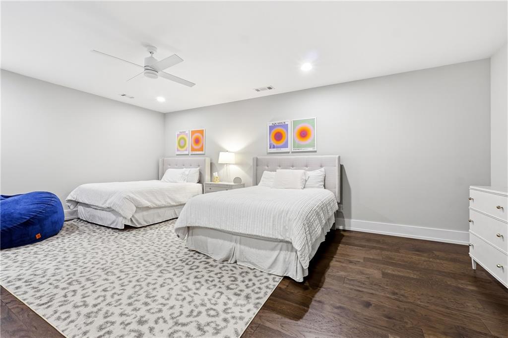 1307 Markham Road Atlanta, GA 30319 - Photo 33 of 47 a bedroom with a bed and a couch