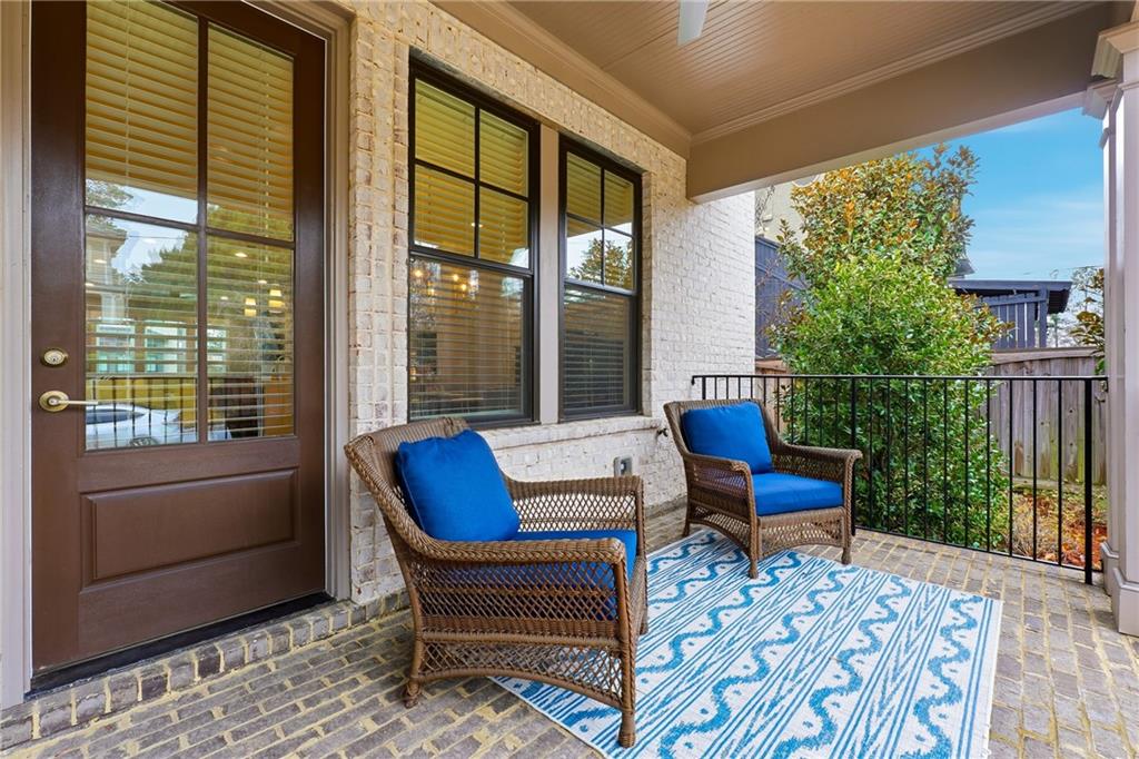 1307 Markham Road Atlanta, GA 30319 - Photo 5 of 47 a outdoor living space with furniture and a potted plant