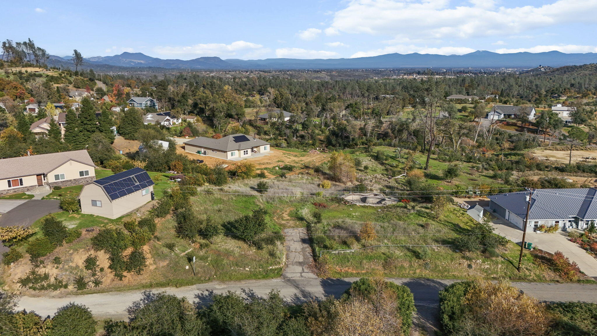 10141 Sandy Lane Redding, CA 96001 - Photo 2 of 10 a view of a city with mountain
