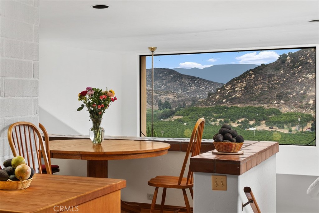 3264 Shearer Crossing Fallbrook, CA 92028 - Photo 11 of 41 a view of a room with a table and chairs