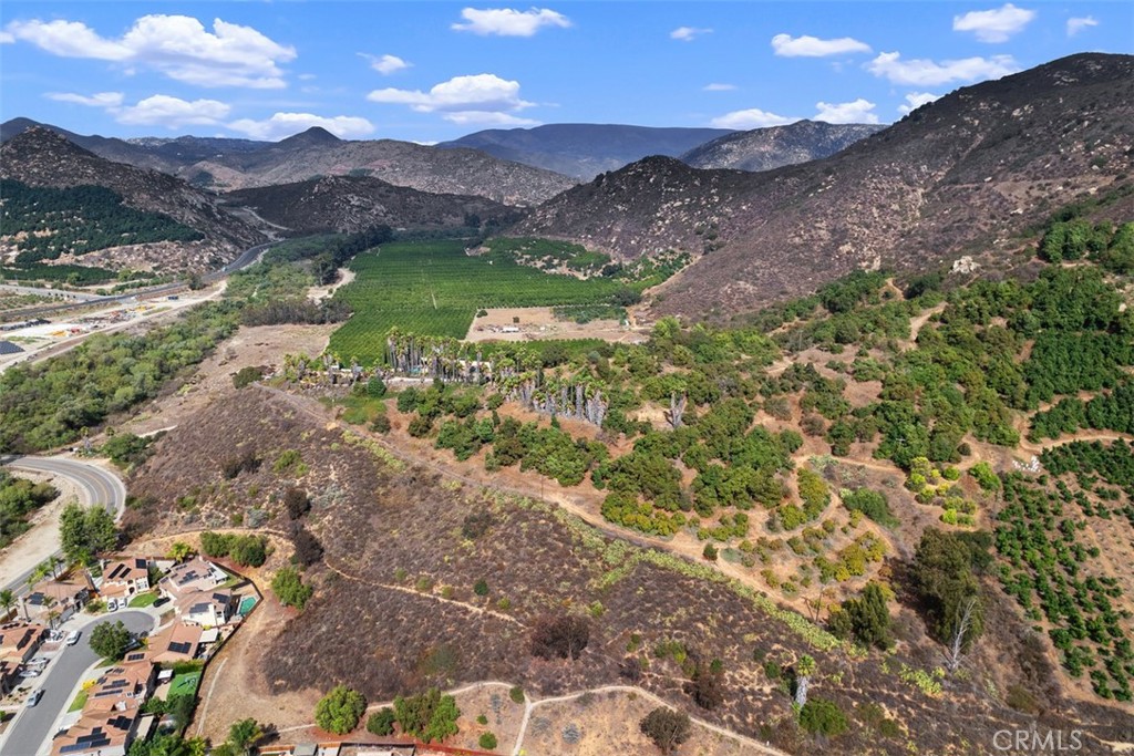 3264 Shearer Crossing Fallbrook, CA 92028 - Photo 33 of 41 a view of a lake with mountains in the background