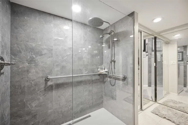 a bed room with a bed and a dresser