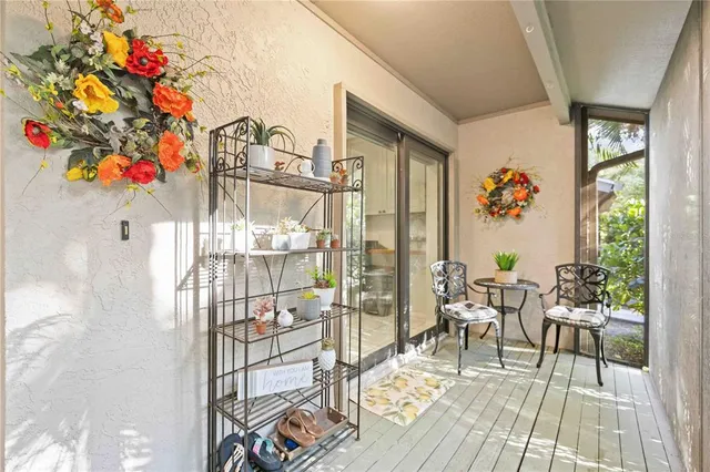 a outdoor space with wooden floor and furniture