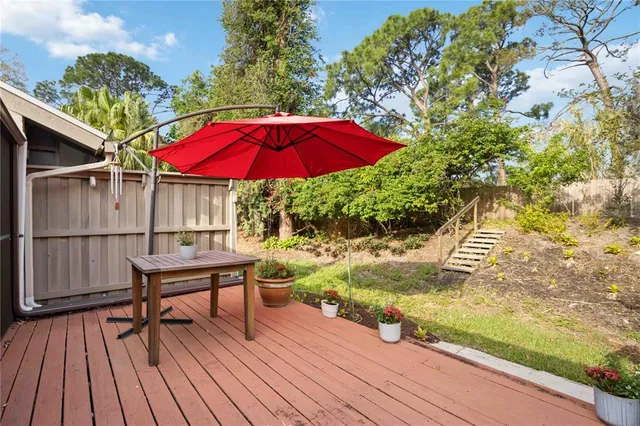 a view of swimming pool with a outdoor seating