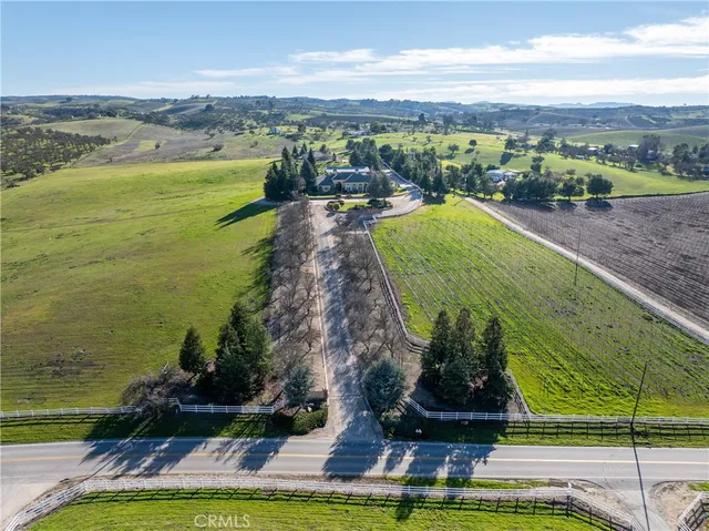 a kitchen with stainless steel appliances a stove sink and microwave