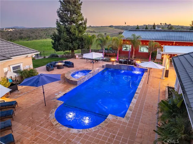 a bathroom with a toilet a sink and a mirror