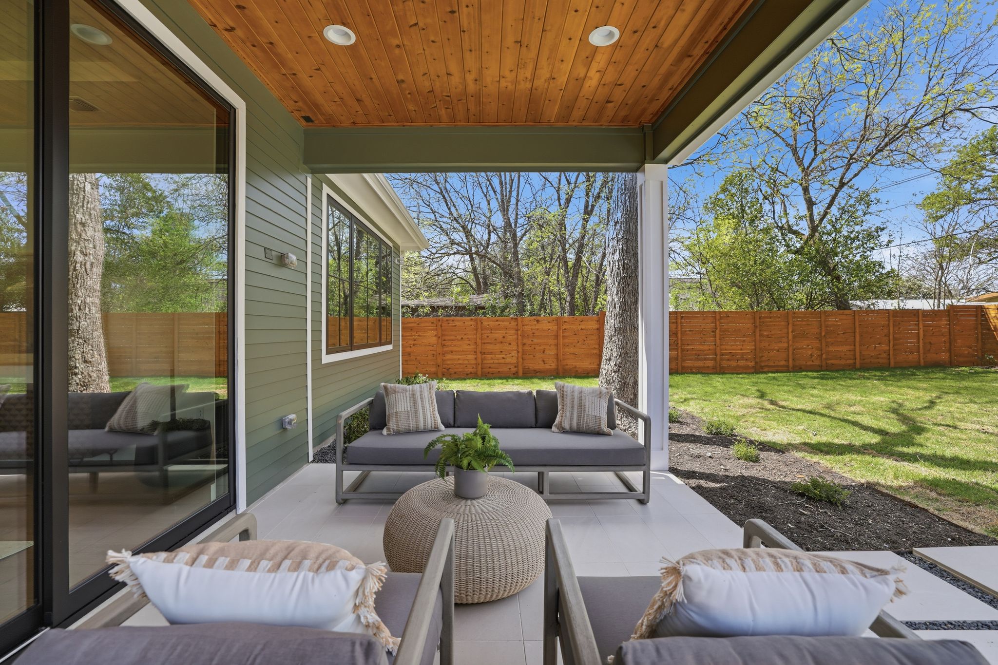 4500 Jinx Avenue Austin, TX 78745 - Photo 34 of 40 Fenced backyard featuring a patio and outdoor furniture