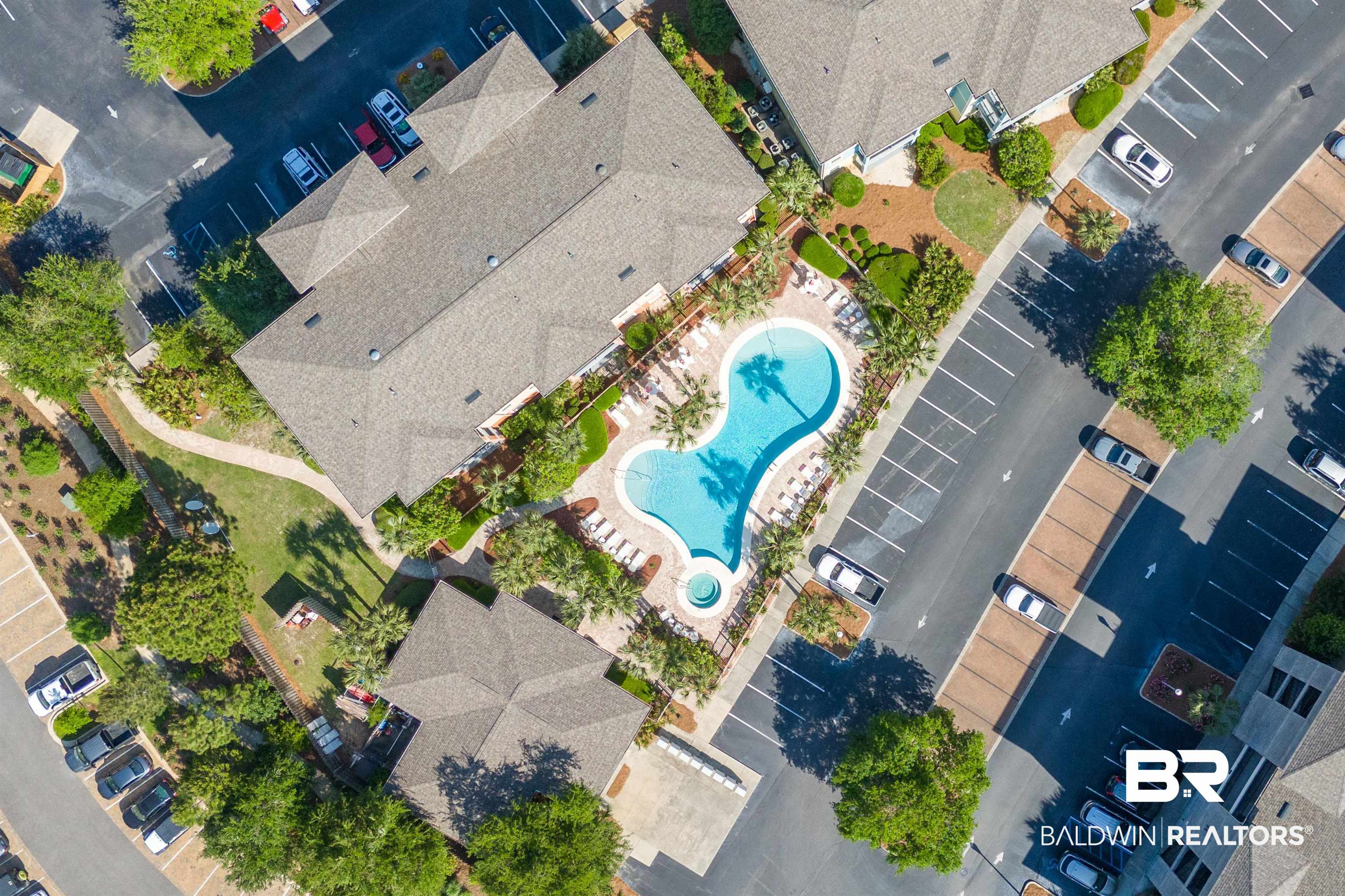 1430 Regency Road, Unit C201 Gulf Shores, AL 36542 - Photo 20 of 54 Aerial view of a pool area