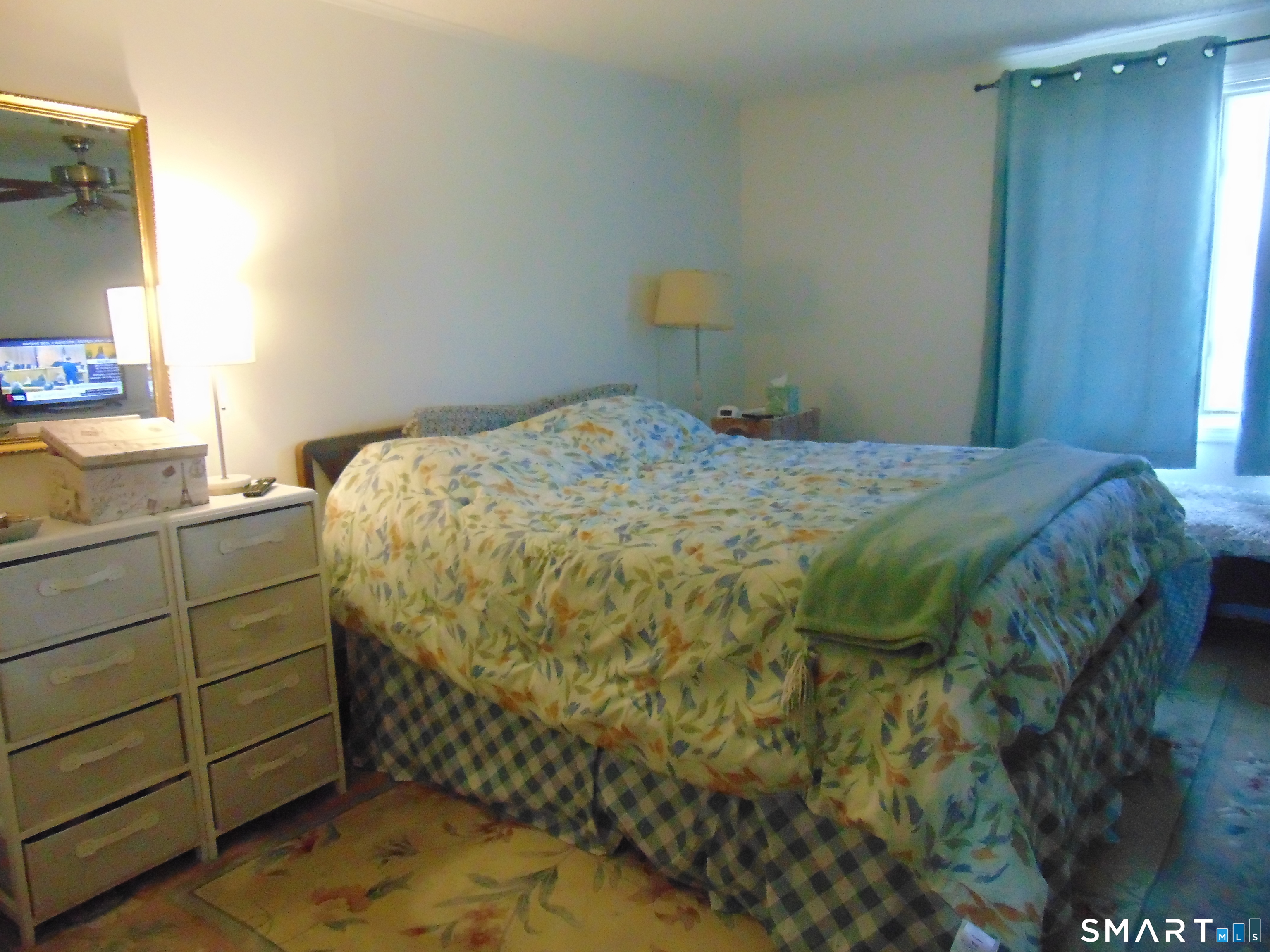 882 North Colony Road, Unit 31 Meriden, CT 06450 - Photo 31 of 34 a bedroom with a bed and a window