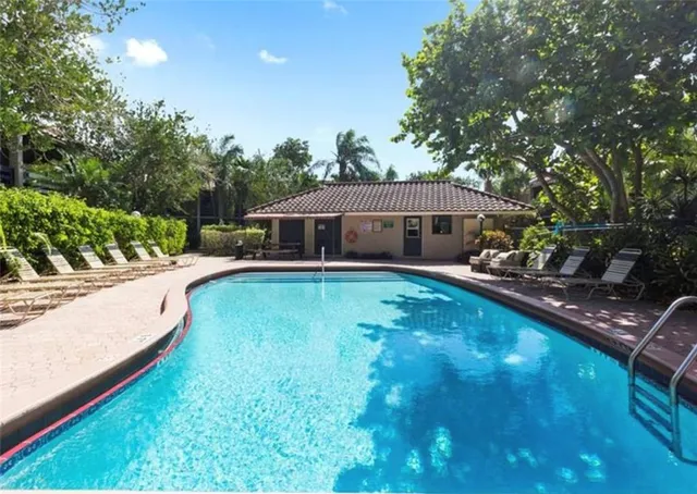 a view of a house with swimming pool