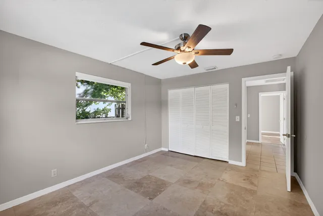 a view of an empty room and window