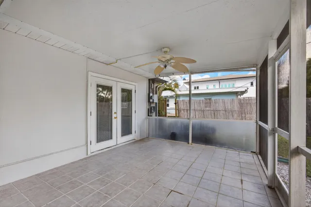 an aerial view of residential houses with city view