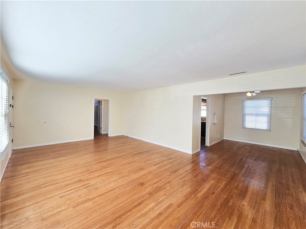 3869 Bandini Avenue Riverside, CA 92506 - Photo 4 of 17 a view of empty room with wooden floor