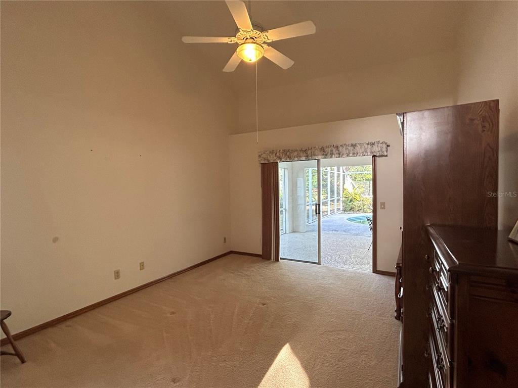 9528 Southeast 70th Terrace Ocala, FL 34472 - Photo 11 of 43 a view of an empty room with a window