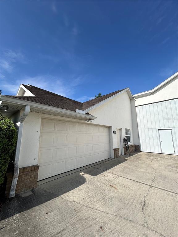 9528 Southeast 70th Terrace Ocala, FL 34472 - Photo 34 of 43 a view of a garage