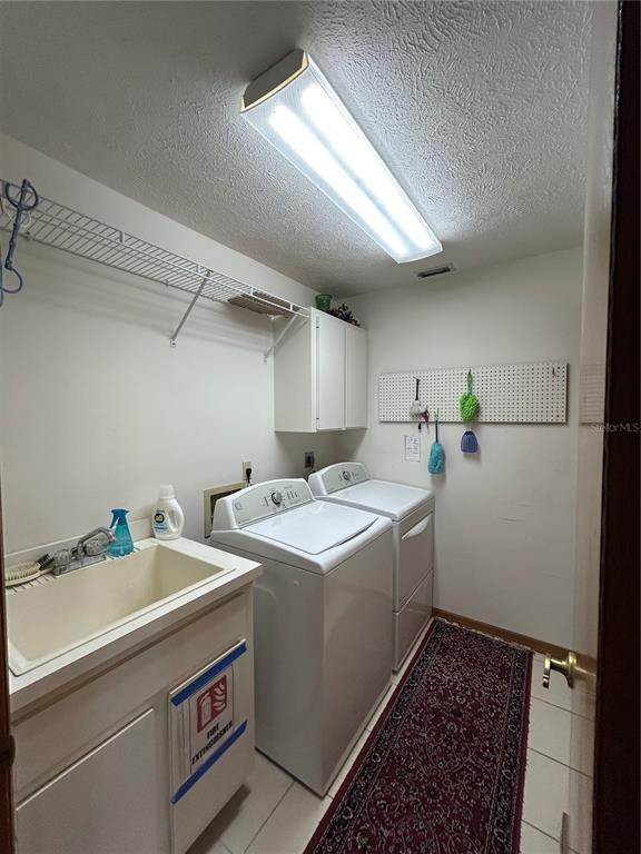 9528 Southeast 70th Terrace Ocala, FL 34472 - Photo 35 of 43 a utility room with dryer and washer