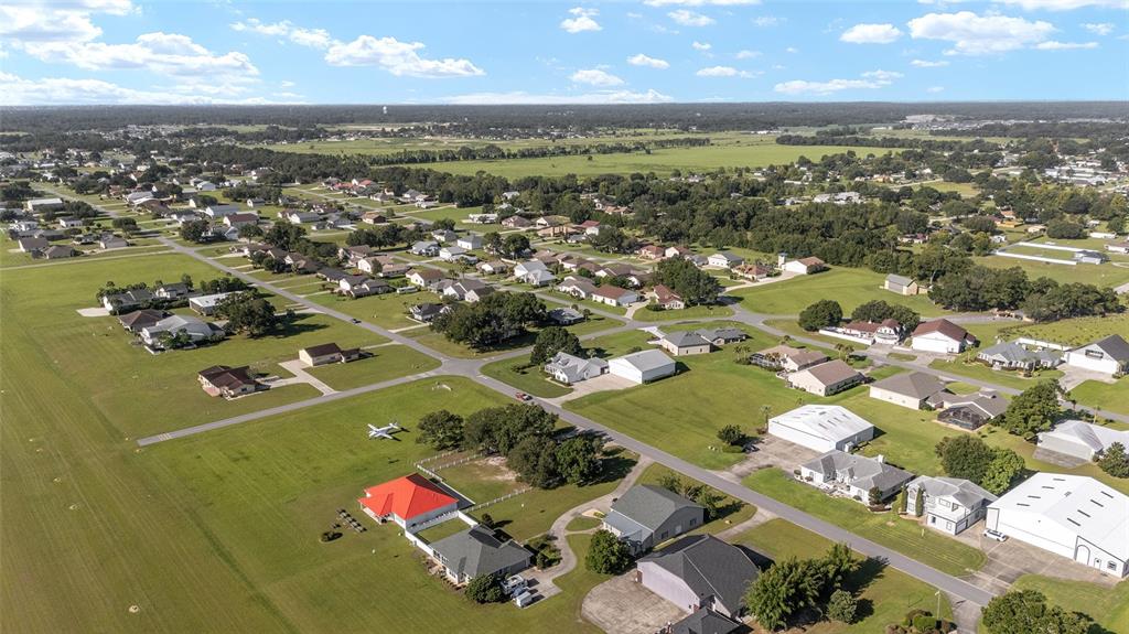 9528 Southeast 70th Terrace Ocala, FL 34472 - Photo 39 of 43 an aerial view of residential houses with outdoor space