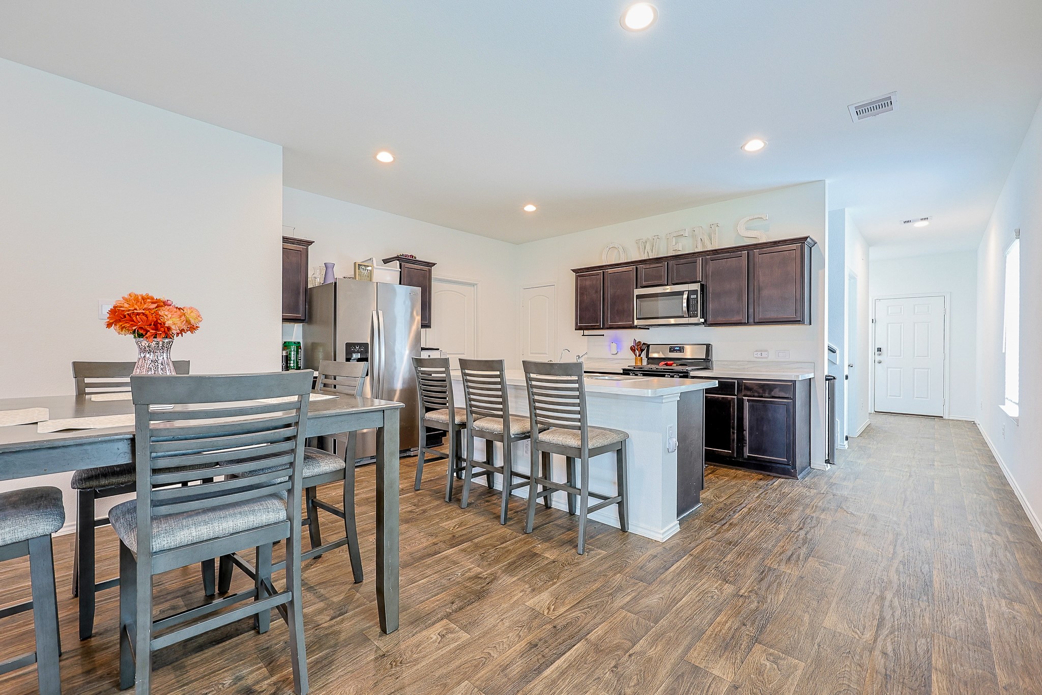 22603 Aspen Tarn Trail Spring, TX 77373 - Photo 8 of 20 a kitchen with a sink appliances and cabinets