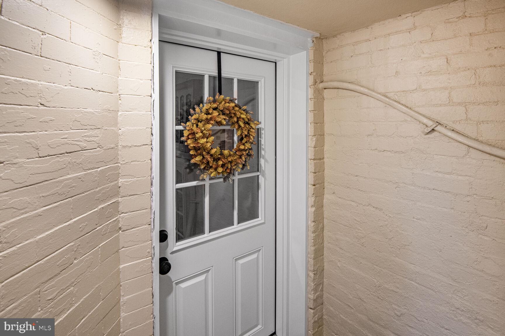 66 Bryant Street Northwest, Unit B Washington, DC 20001 - Photo 17 of 17 a glass door with a window