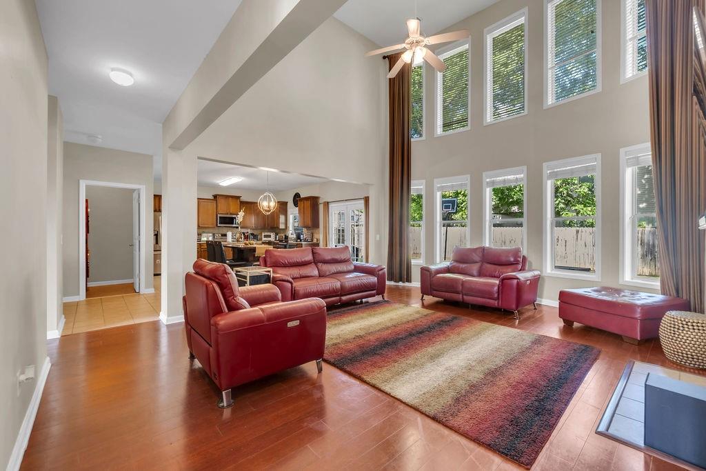 126 Meadow's Walk Drive Byron, GA 31008 - Photo 12 of 37 a living room with furniture and a large window