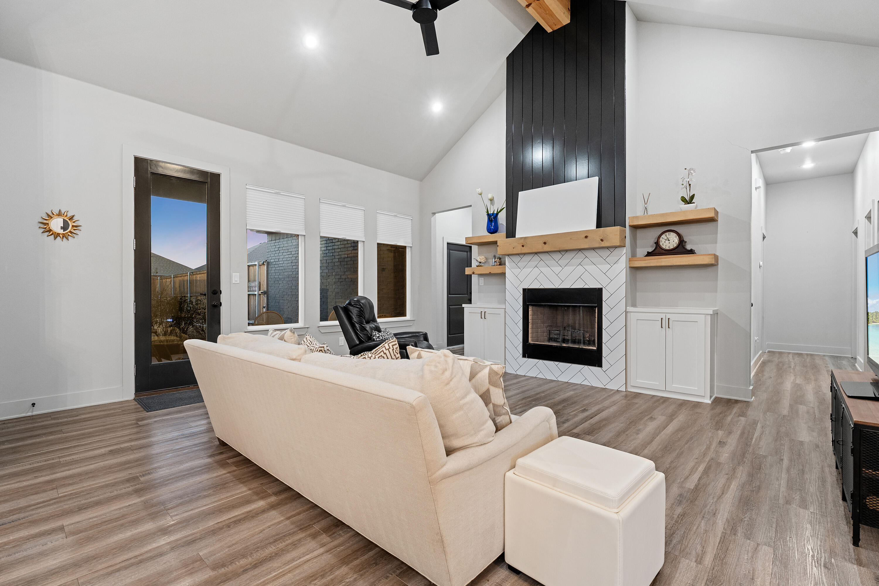 7814 55th Street Lubbock, TX 79407 - Photo 2 of 27 a living room with furniture and a fireplace