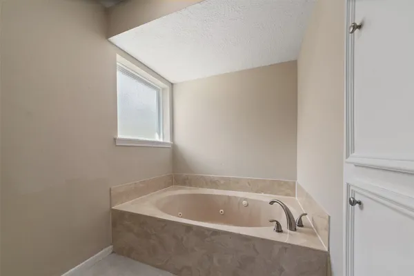 a bathroom with bathtub