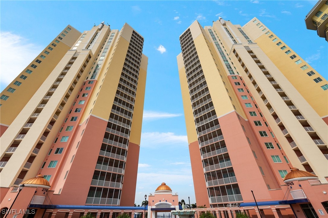 2745 First Street, Unit 1906 Fort Myers, FL 33916 - Photo 1 of 33 a view of building with multi story windows