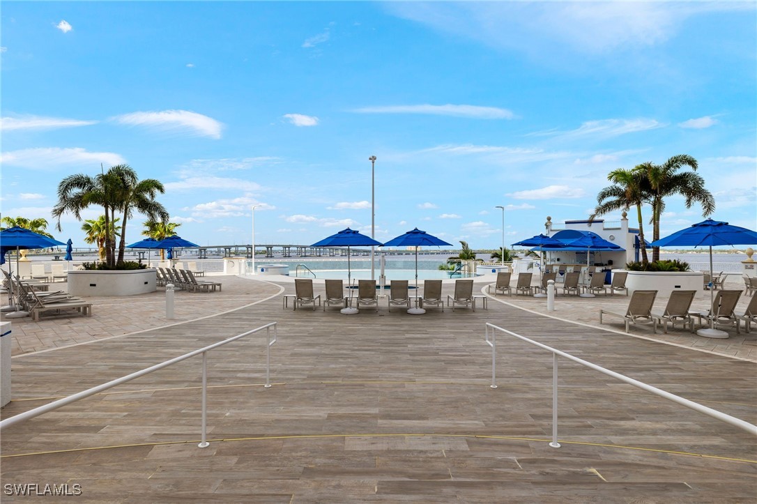 2745 First Street, Unit 1906 Fort Myers, FL 33916 - Photo 31 of 33 a view of a building and a yard