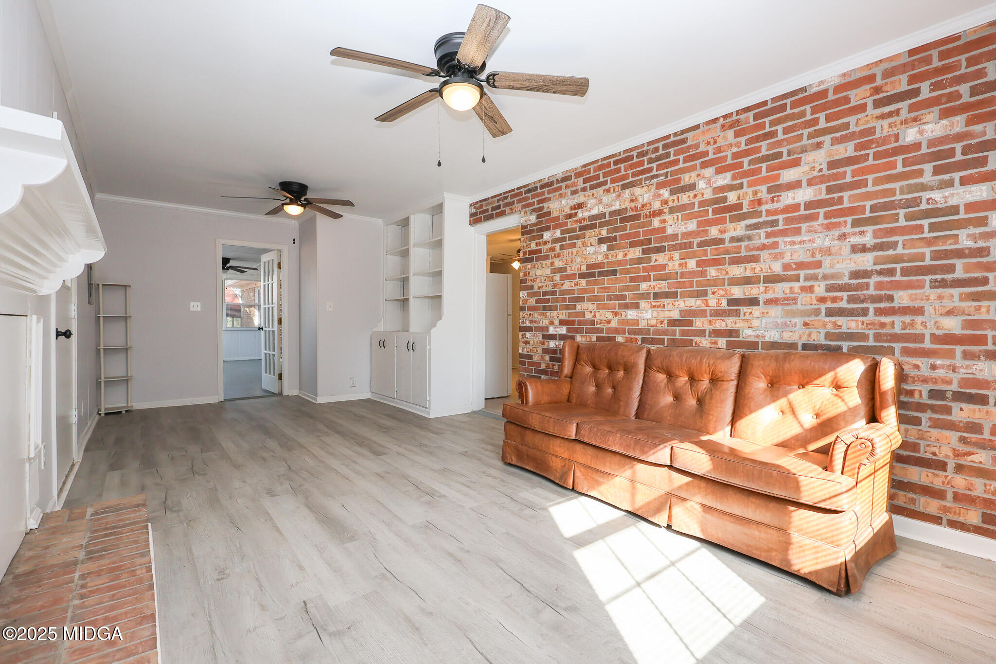 105 Larryton Drive Cochran, GA 31014 - Photo 12 of 34 a view of empty room with wooden floor