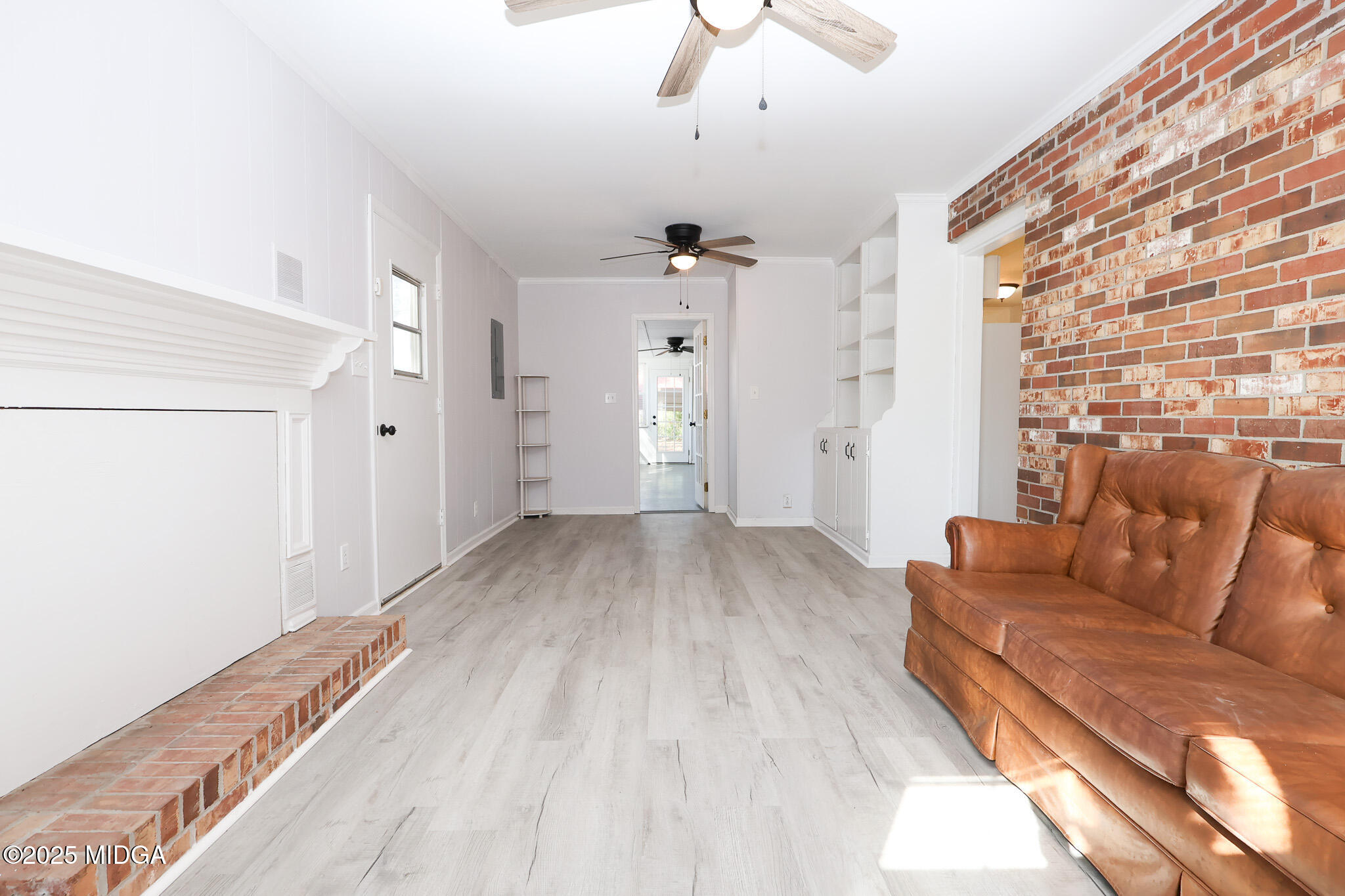 105 Larryton Drive Cochran, GA 31014 - Photo 13 of 34 a view of livingroom with furniture and wooden floor