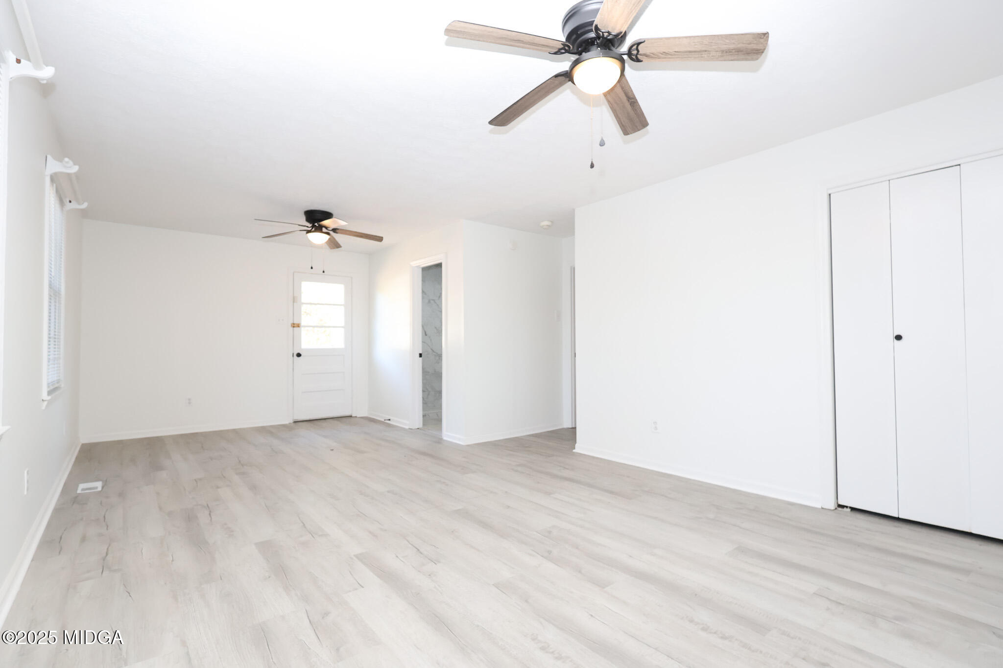 105 Larryton Drive Cochran, GA 31014 - Photo 16 of 34 wooden floor in an empty room