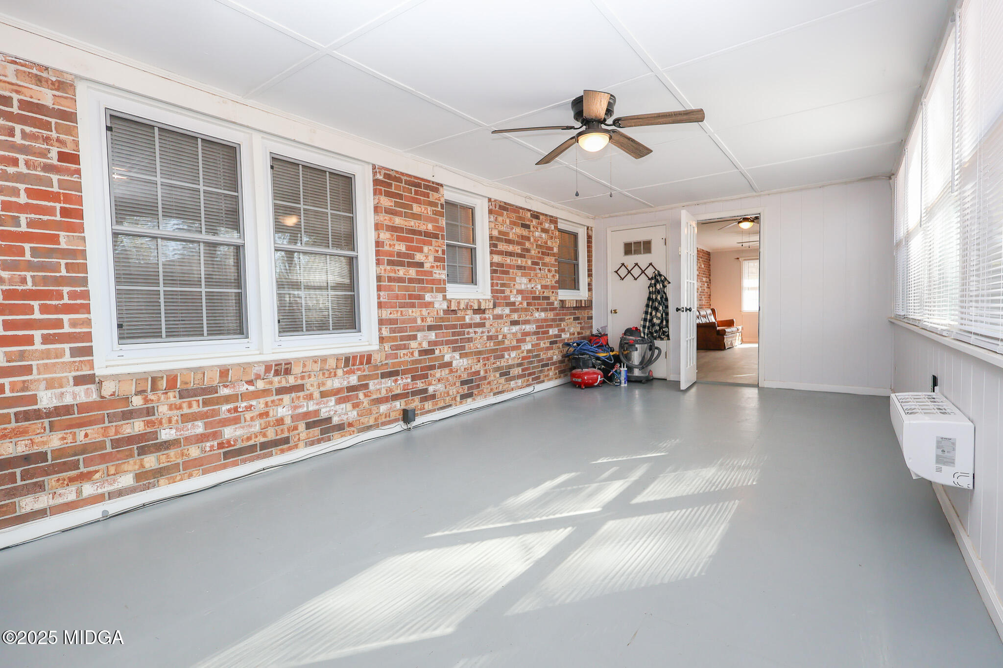 105 Larryton Drive Cochran, GA 31014 - Photo 28 of 34 a view of a livingroom with furniture and windows
