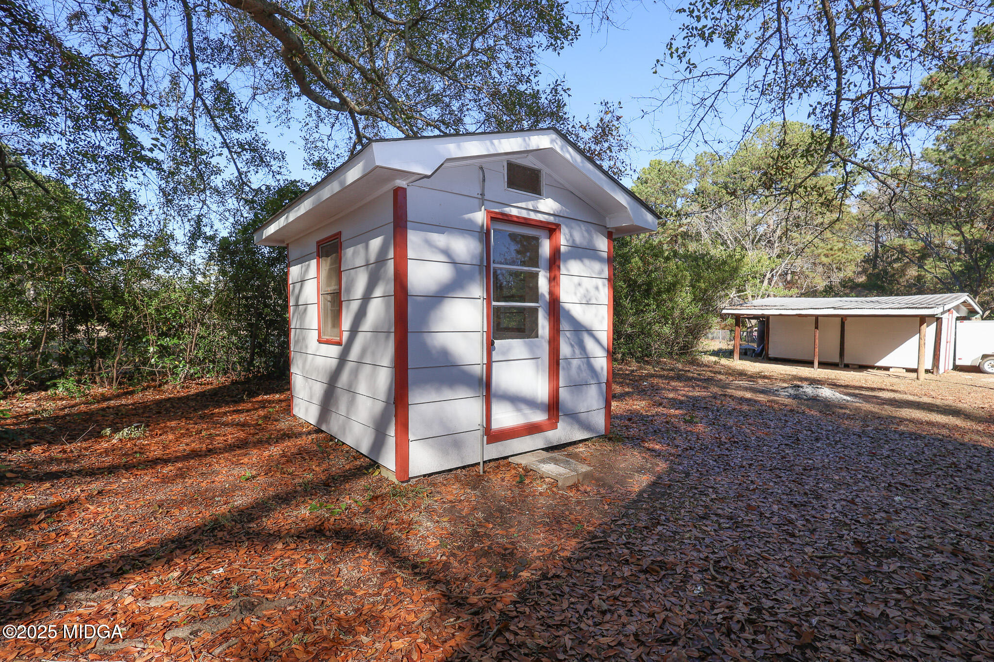 105 Larryton Drive Cochran, GA 31014 - Photo 32 of 34 a view of a house with a yard