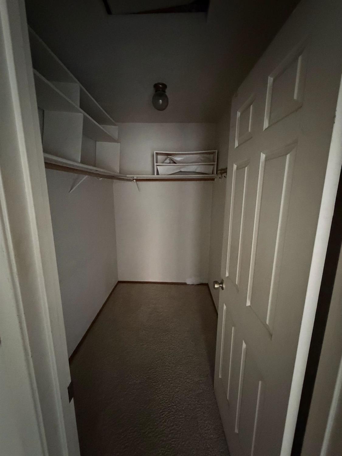 536 Capistrano Drive Modesto, CA 95354 - Photo 12 of 18 a view of a room with racks on the wall