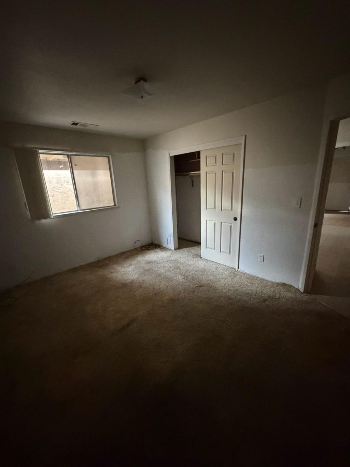 536 Capistrano Drive Modesto, CA 95354 - Photo 7 of 18 a view of empty room with window