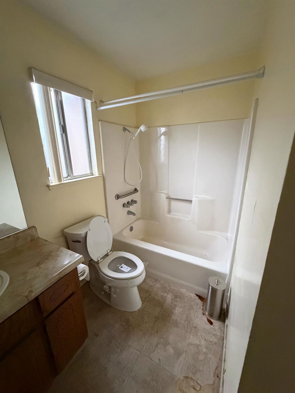 536 Capistrano Drive Modesto, CA 95354 - Photo 9 of 18 a bathroom with a sink a toilet and a shower