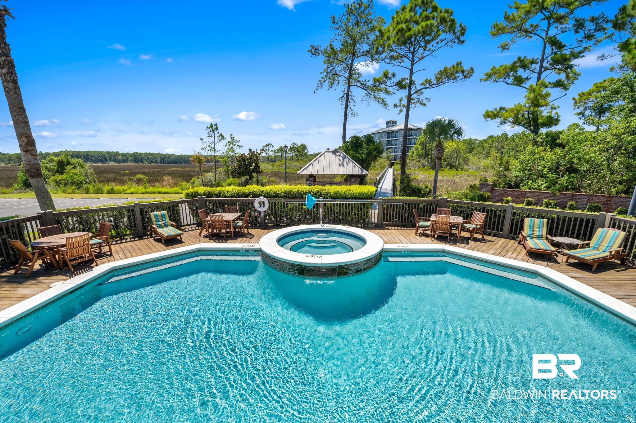 3882 Lafitte Boulevard Gulf Shores, AL 36542 - Photo 17 of 28 Outdoor pool area