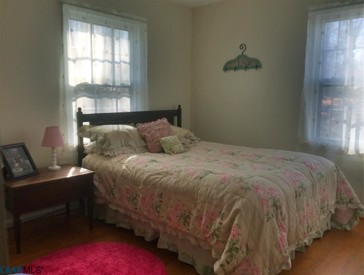 4354 Dickerson Road Charlottesville, VA 22911 - Photo 14 of 21 a bedroom with a bed and a window