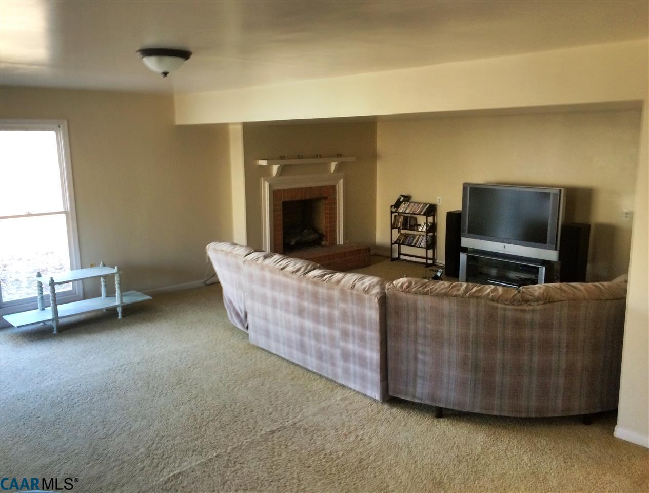 4354 Dickerson Road Charlottesville, VA 22911 - Photo 17 of 21 a living room with furniture and a flat screen tv