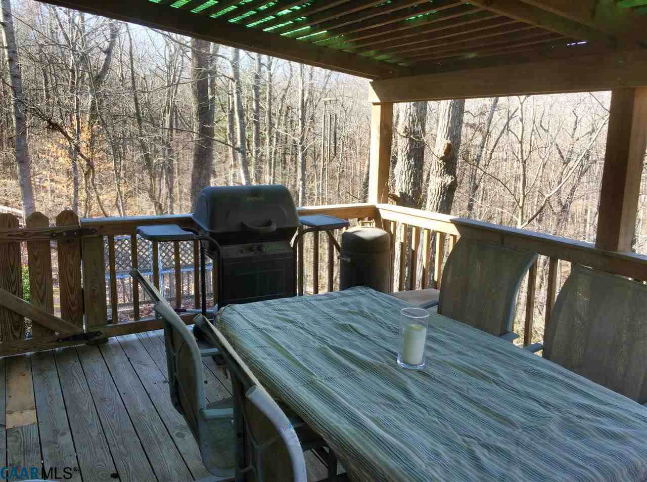 4354 Dickerson Road Charlottesville, VA 22911 - Photo 6 of 21 a view of a balcony with furniture and wooden floor