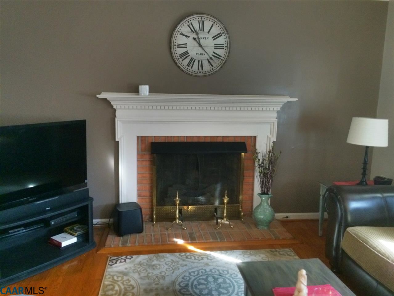 4354 Dickerson Road Charlottesville, VA 22911 - Photo 7 of 21 a living room with furniture and a flat screen tv