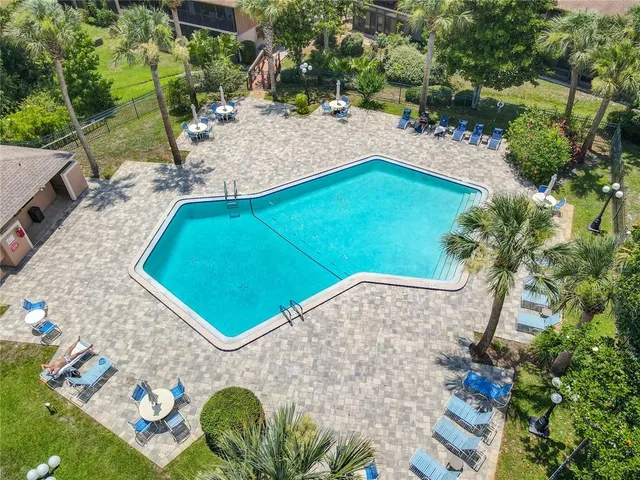 an aerial view of a house with a garden