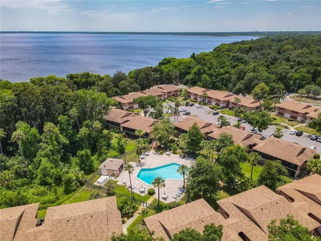 a sign that is sitting in the forest