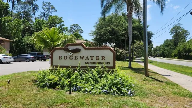 a street sign sitting on the side of a road