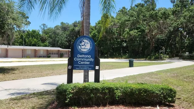 a view of backyard with green space