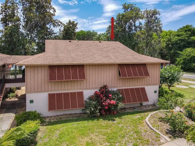 a bathroom with a sink a mirror and a shower