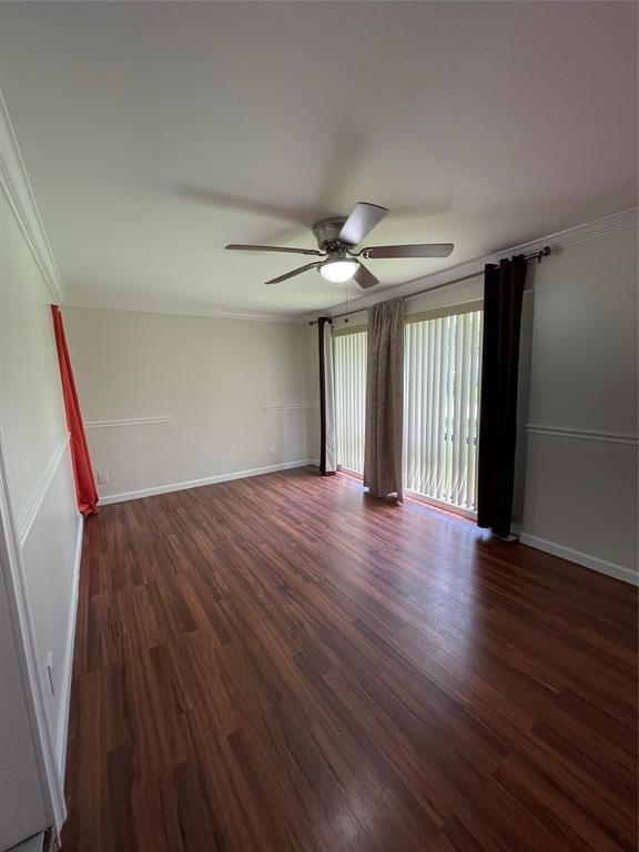 6101 Northwest 18th Street Margate, FL 33063 - Photo 16 of 22 a view of an empty room with wooden floor and a window